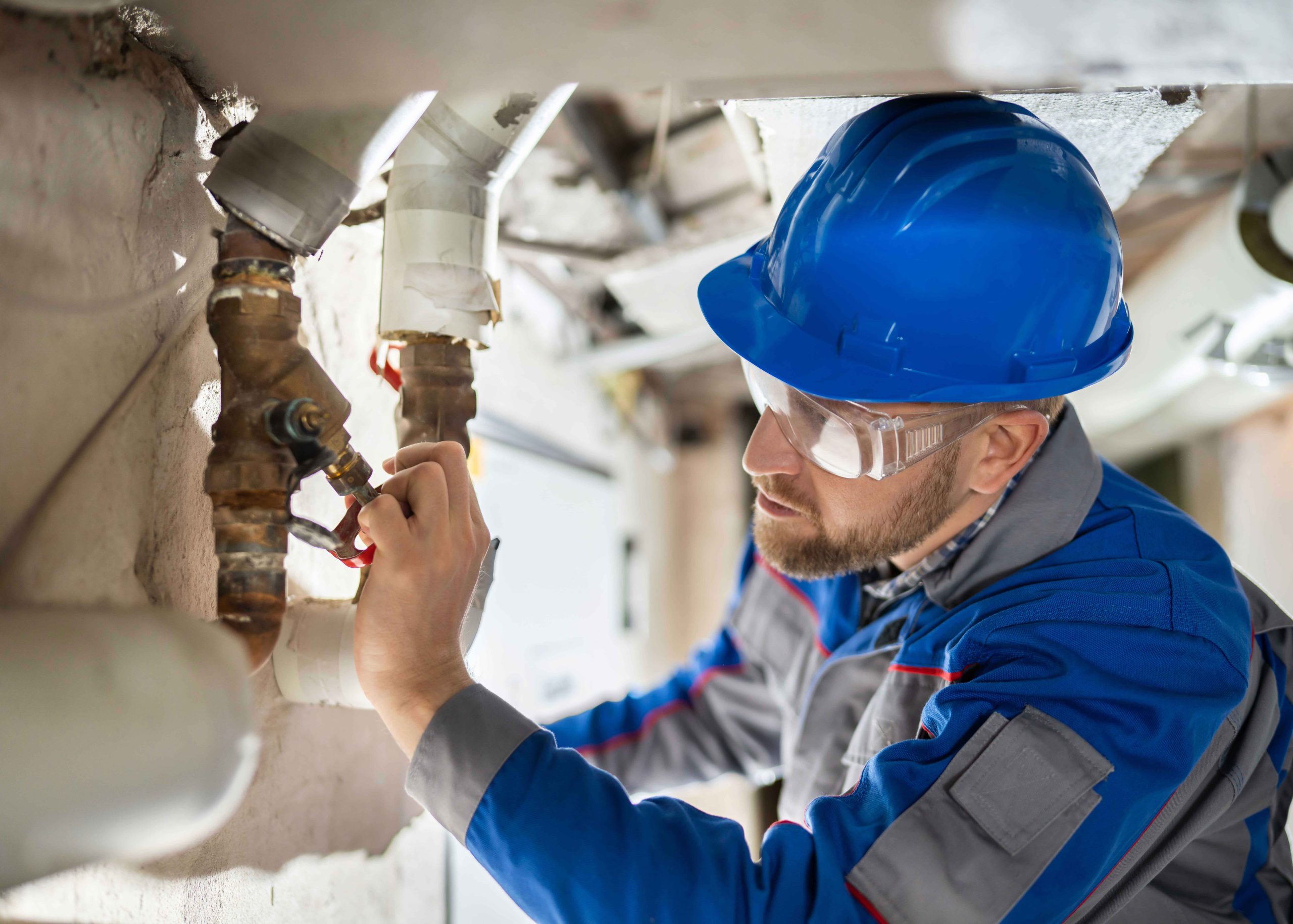 Technician repairing a pipe in a newer Avery Ranch home in Austin, TX