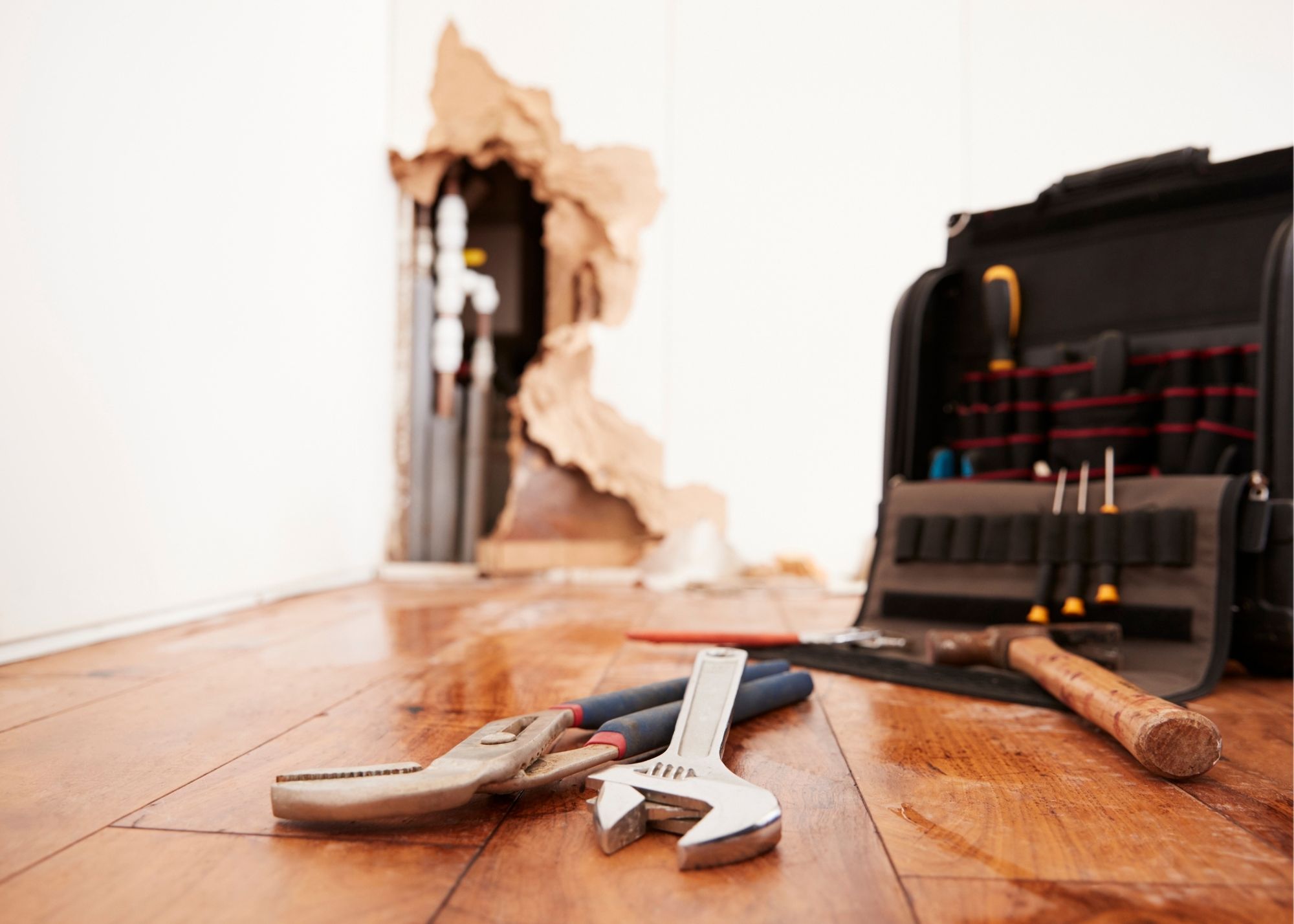Tools for removing water-damaged drywall in an Austin, TX home